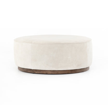 Sinclair Round Ottoman by Four Hands. Made from unique in a modern style.