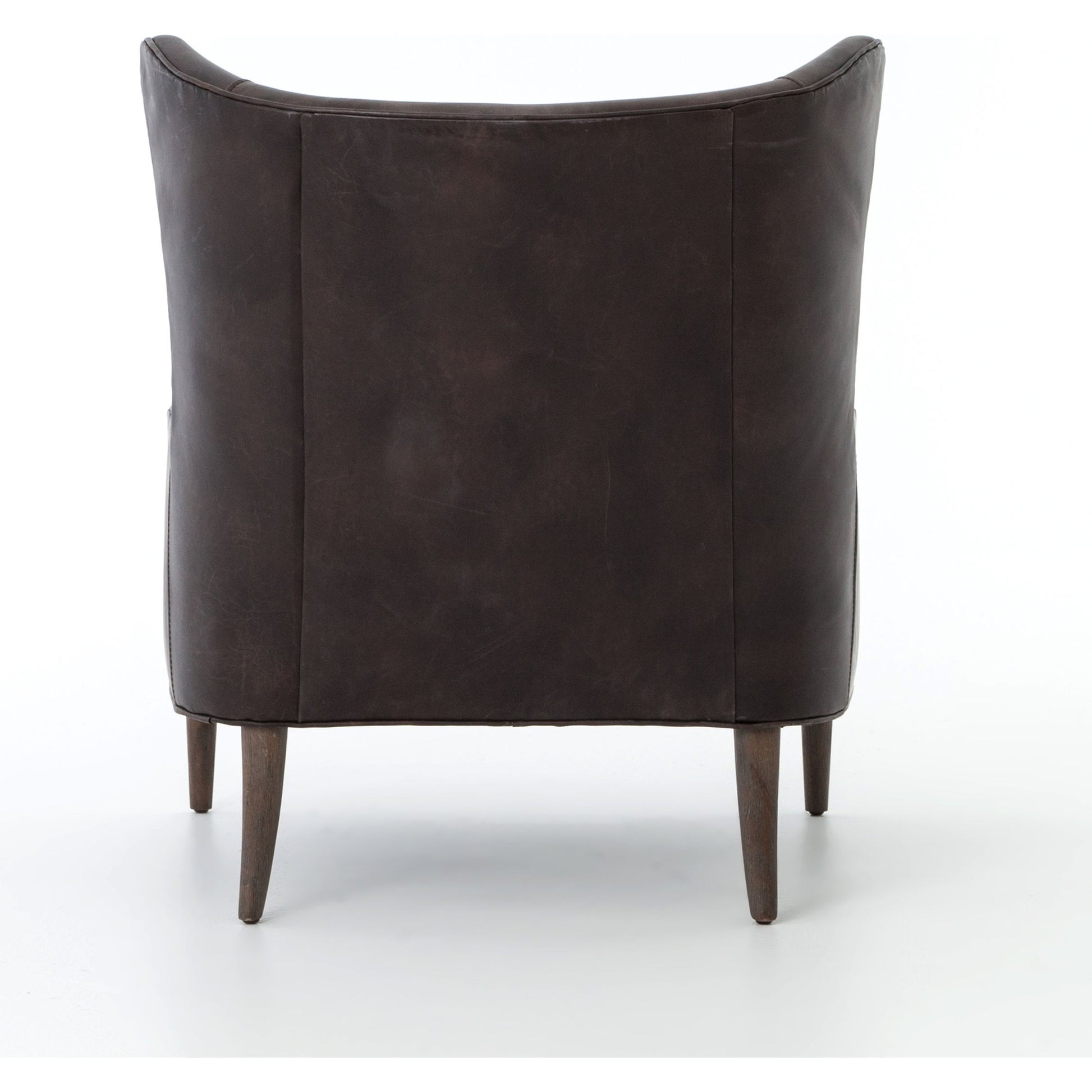 Marlow Wing Chair by Four Hands. Made from top grain leather, solid parawood, 100% polyester in a modern style.