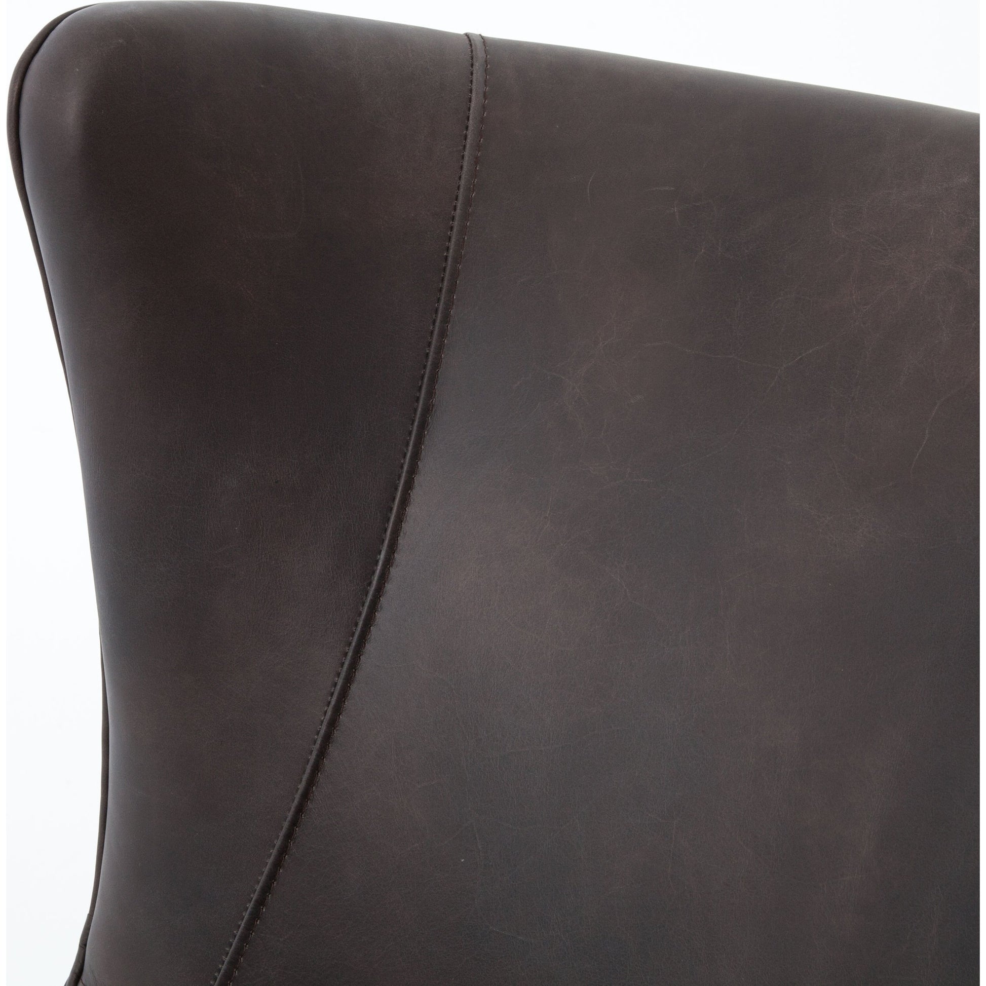 Marlow Wing Chair by Four Hands. Made from top grain leather, solid parawood, 100% polyester in a modern style.