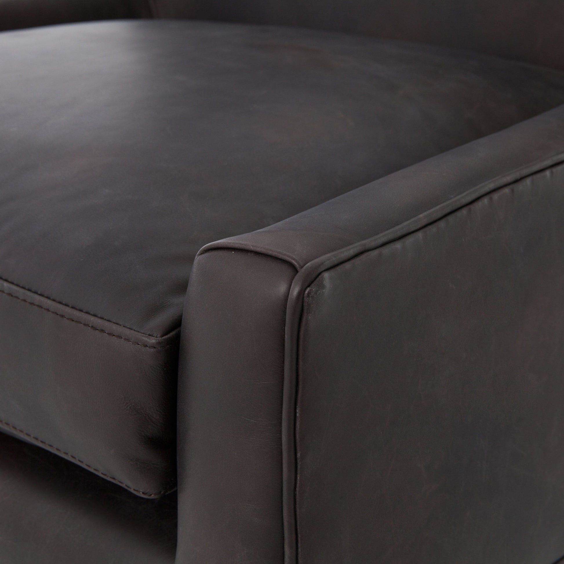Marlow Wing Chair by Four Hands. Made from top grain leather, solid parawood, 100% polyester in a modern style.
