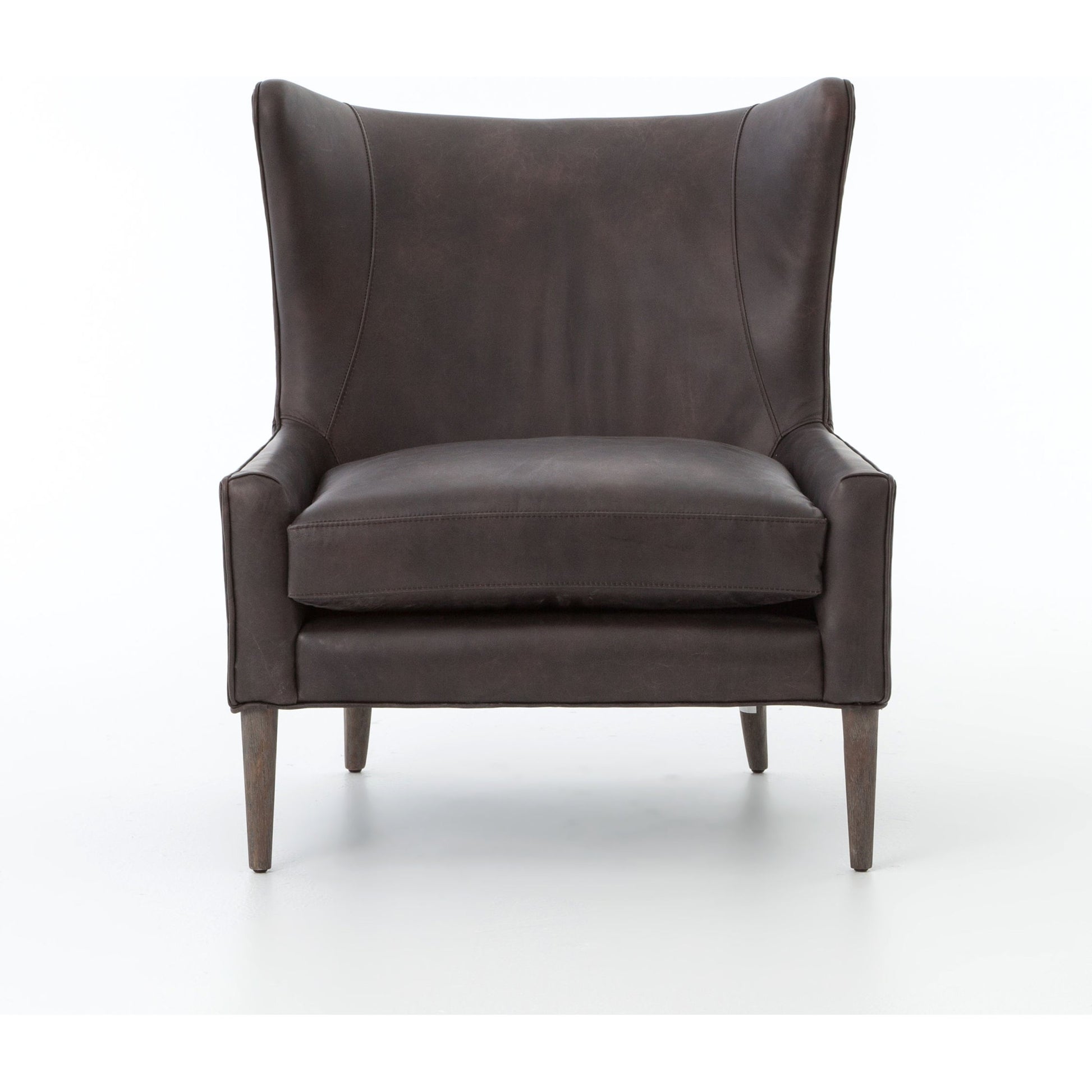 Marlow Wing Chair by Four Hands. Made from top grain leather, solid parawood, 100% polyester in a modern style.