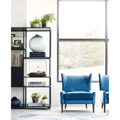 Marlow Wing Chair by Four Hands. Made from top grain leather, solid parawood, 100% polyester in a modern style.