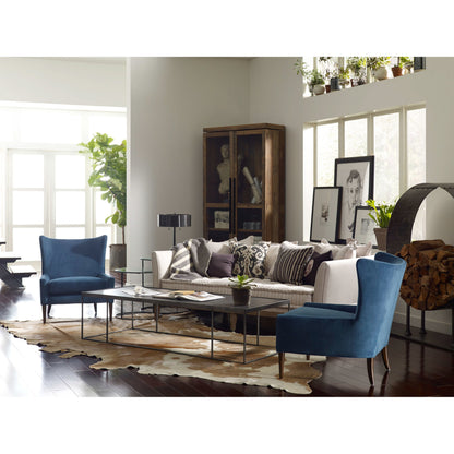 Marlow Wing Chair by Four Hands. Made from top grain leather, solid parawood, 100% polyester in a modern style.