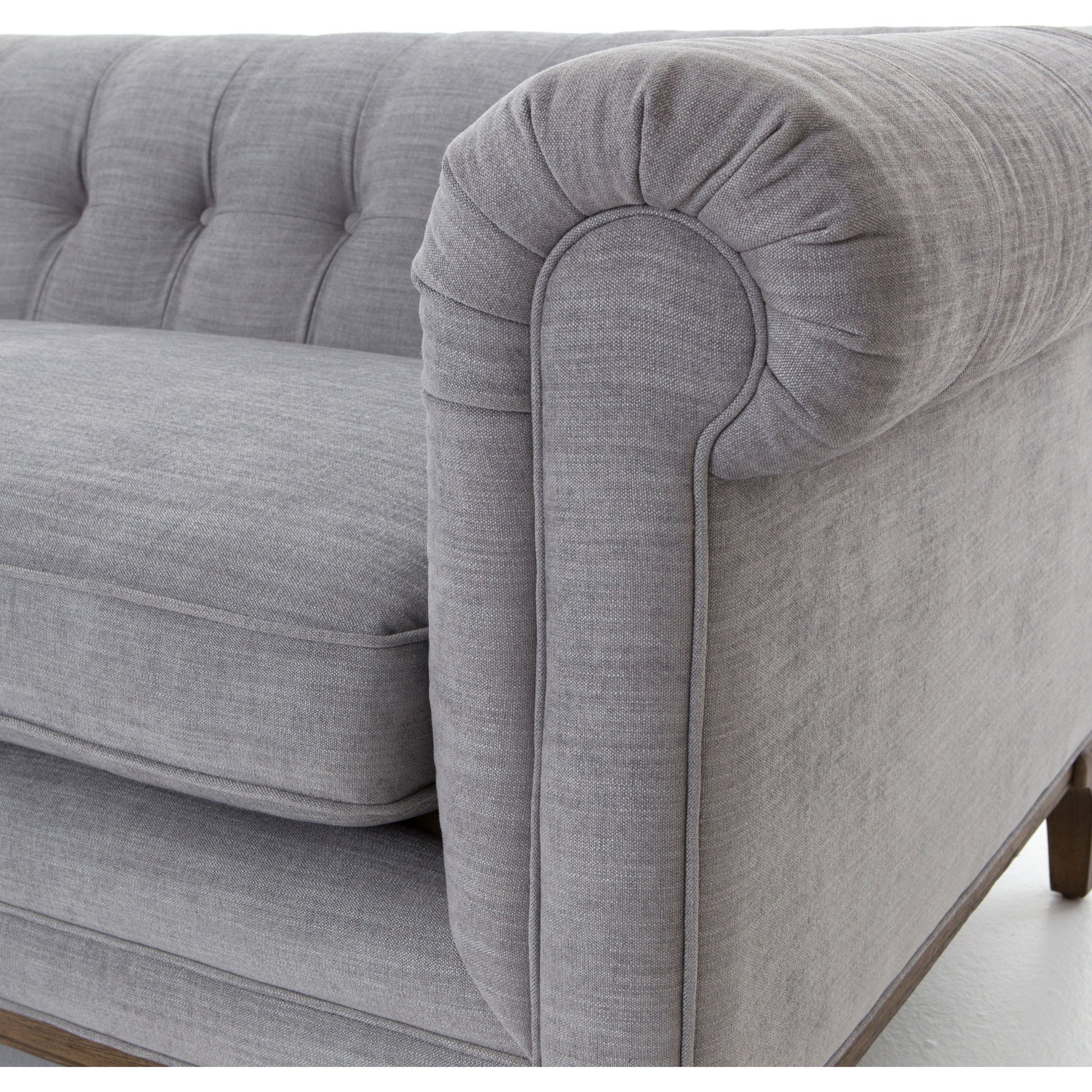 Griffon Sofa by Four Hands in plush navy and plush navy, antique walnut. Made from 100% polyester, solid parawood in a modern style.