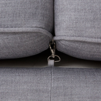 Griffon Sofa by Four Hands in plush navy and plush navy, antique walnut. Made from 100% polyester, solid parawood in a modern style.