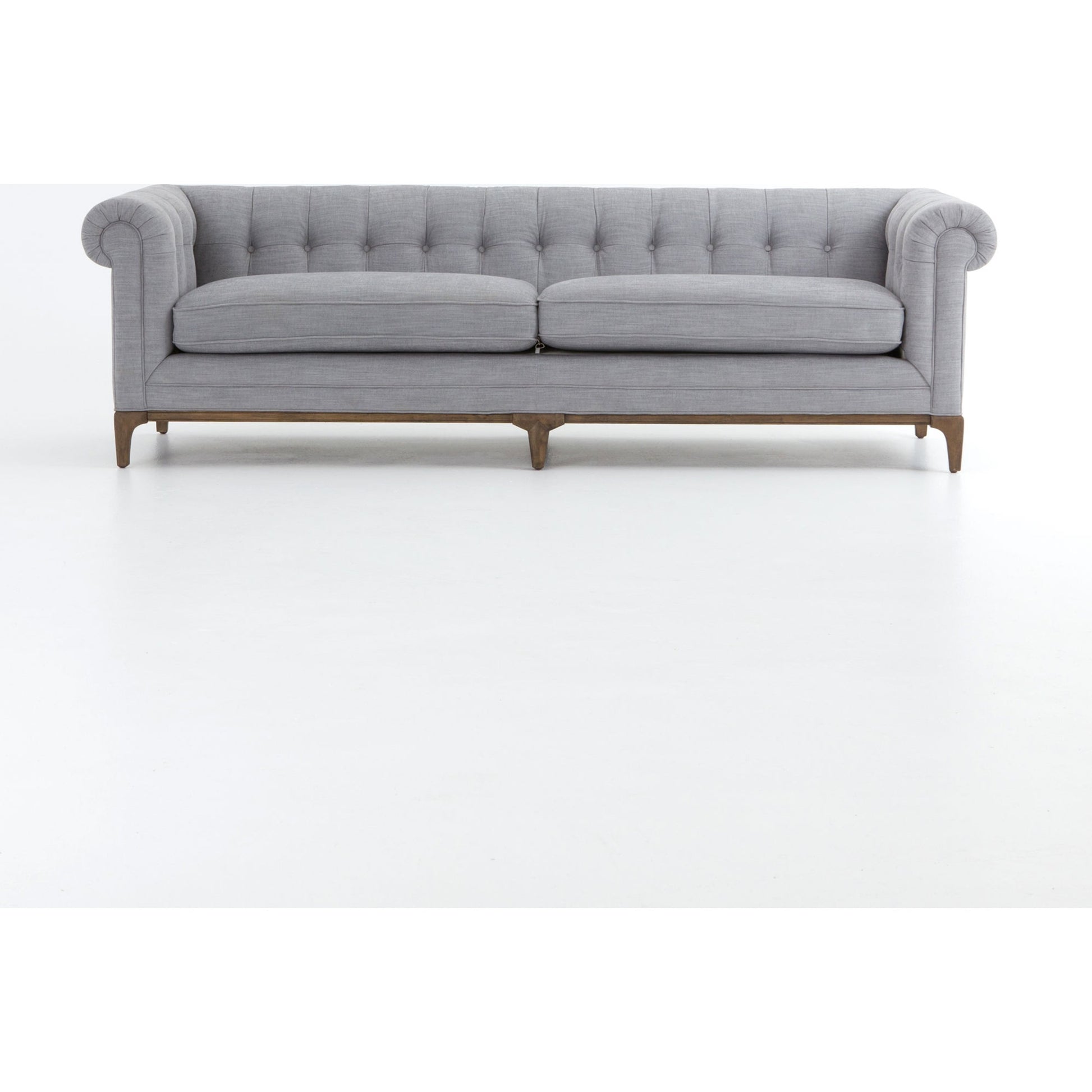 Griffon Sofa by Four Hands in plush navy and plush navy, antique walnut. Made from 100% polyester, solid parawood in a modern style.