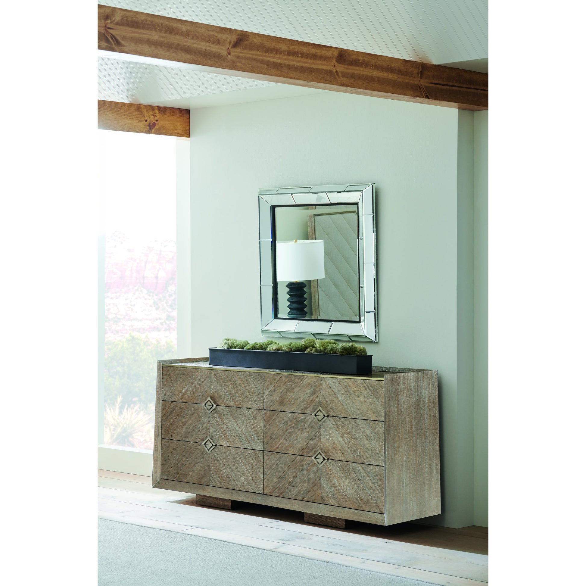 Naturally by Caracole in natural and ash driftwood, sundance gold. Made from ash, quarter ash in a modern style.