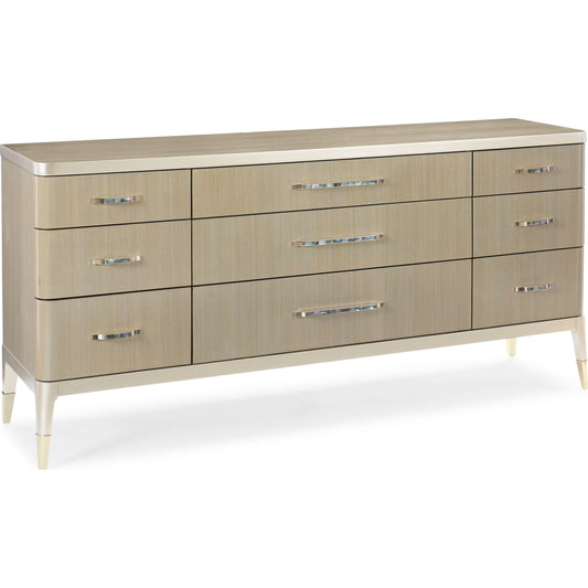All Dressed Up Dresser by Caracole in champagne and champagne shimmer, taupe paint, whisper of gold. Made from birch, koto in a transitional style.