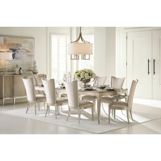 On a Silver Platter Dining Table by Caracole in maple, silver and moonlit sand, soft silver leaf. Made from pine, birch, silver curly maple in a transitional style.