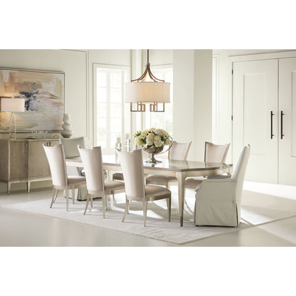 On a Silver Platter Dining Table by Caracole in maple, silver and moonlit sand, soft silver leaf. Made from pine, birch, silver curly maple in a transitional style.