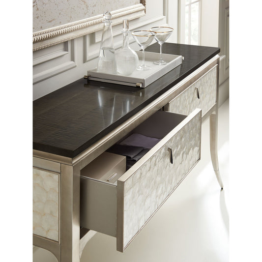 Shell It Like It Is Console by Caracole in maple, silver and midnight maple, soft silver leaf, soft silver paint, lightly brushed chrome. Made from pine, birch, black curly maple in a transitional style.