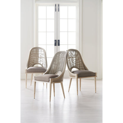 Cane I Join You by Caracole in gold and neutral metallic. Made from birch, woven cane in a transitional style.