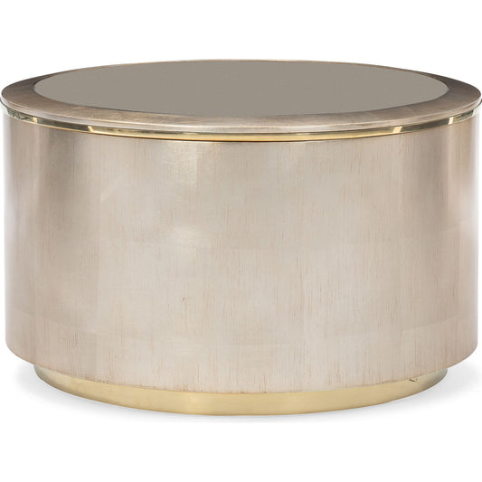 Lobby Cocktail Table by Caracole in bronze, gold and auric, gold bullion. Made from birch, metal, maple in a transitional style.