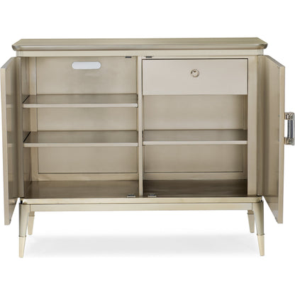 A Shimmer of Light by Caracole in champagne, taupe, gold and champagne shimmer, taupe paint. Made from birch, dyed koto, maple in a transitional style.