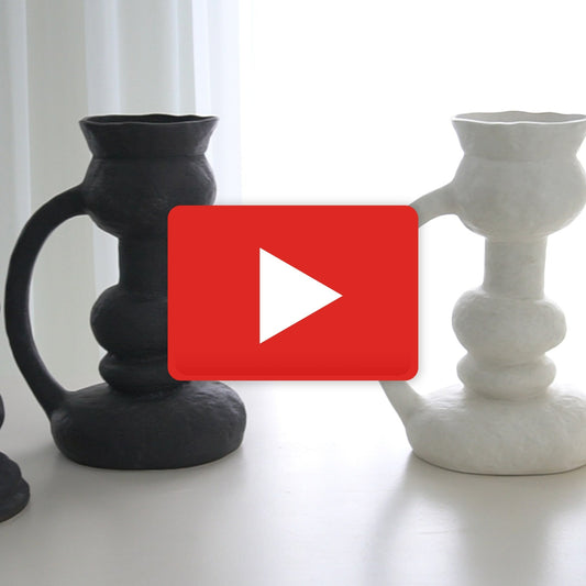 Remi Vase by Global Views. Made from ceramic in a eclectic & global style.