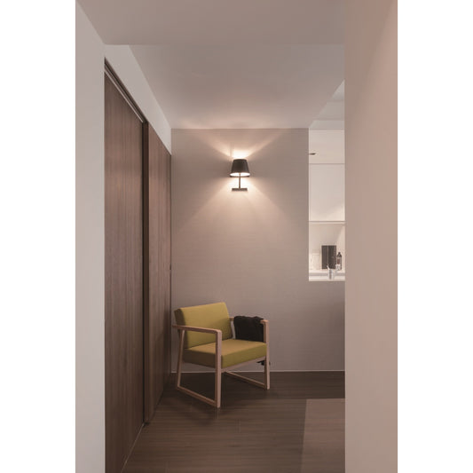 Concom Wall Lamp by Seed Design. Made from steel in a modern style.