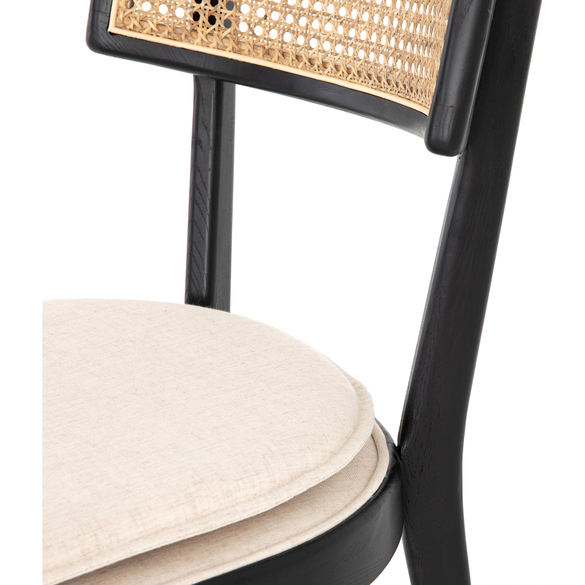 Britt Dining Chair by Four Hands in natural cane, savile flax, brushed ebony. Made from 92% polyester, 8% flax, linen, solid nettlewood, cane in a modern style.