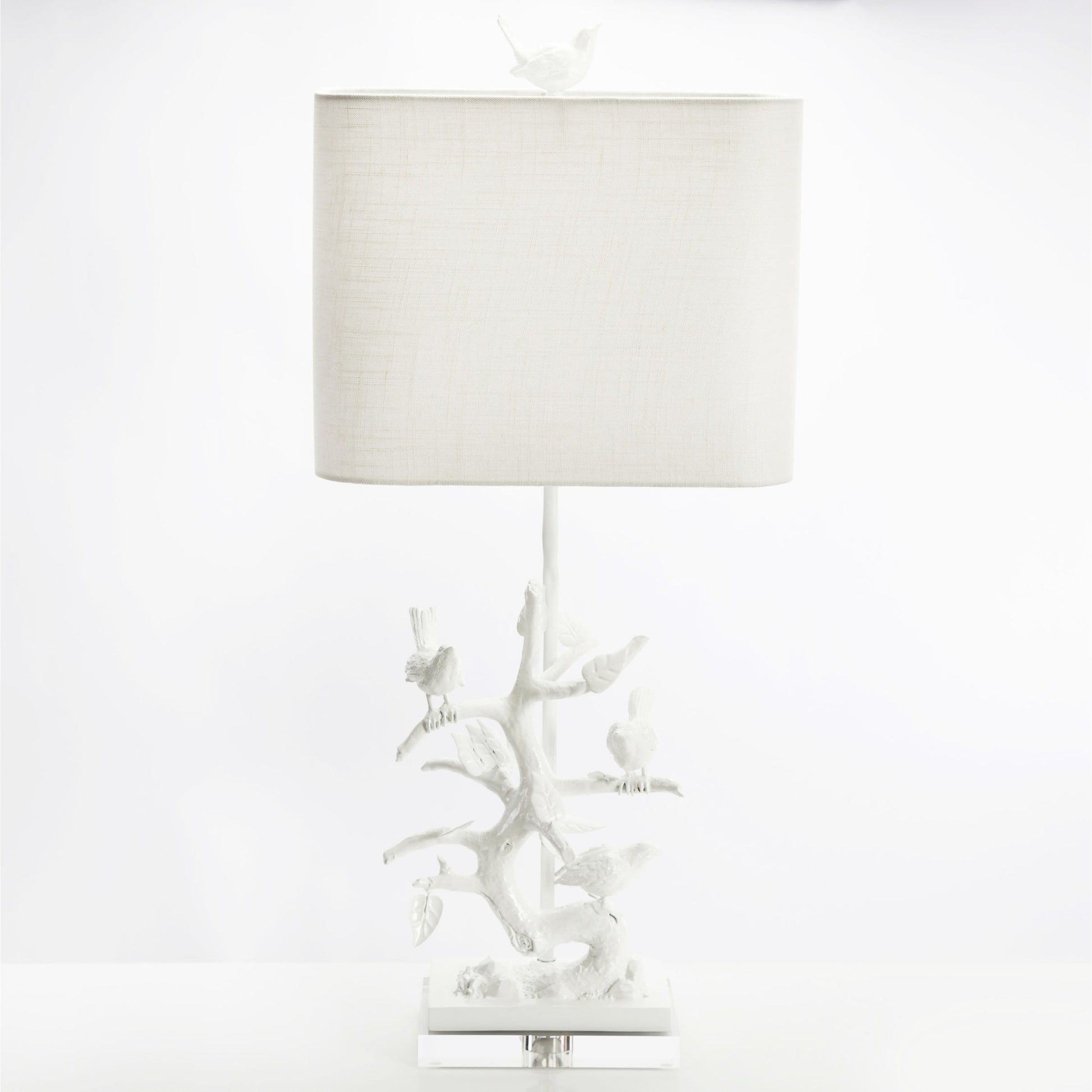 Bird on Branch Table Lamp by Couture Lamps in high gloss white. Made from iron, resin, acrylic in a coastal style.