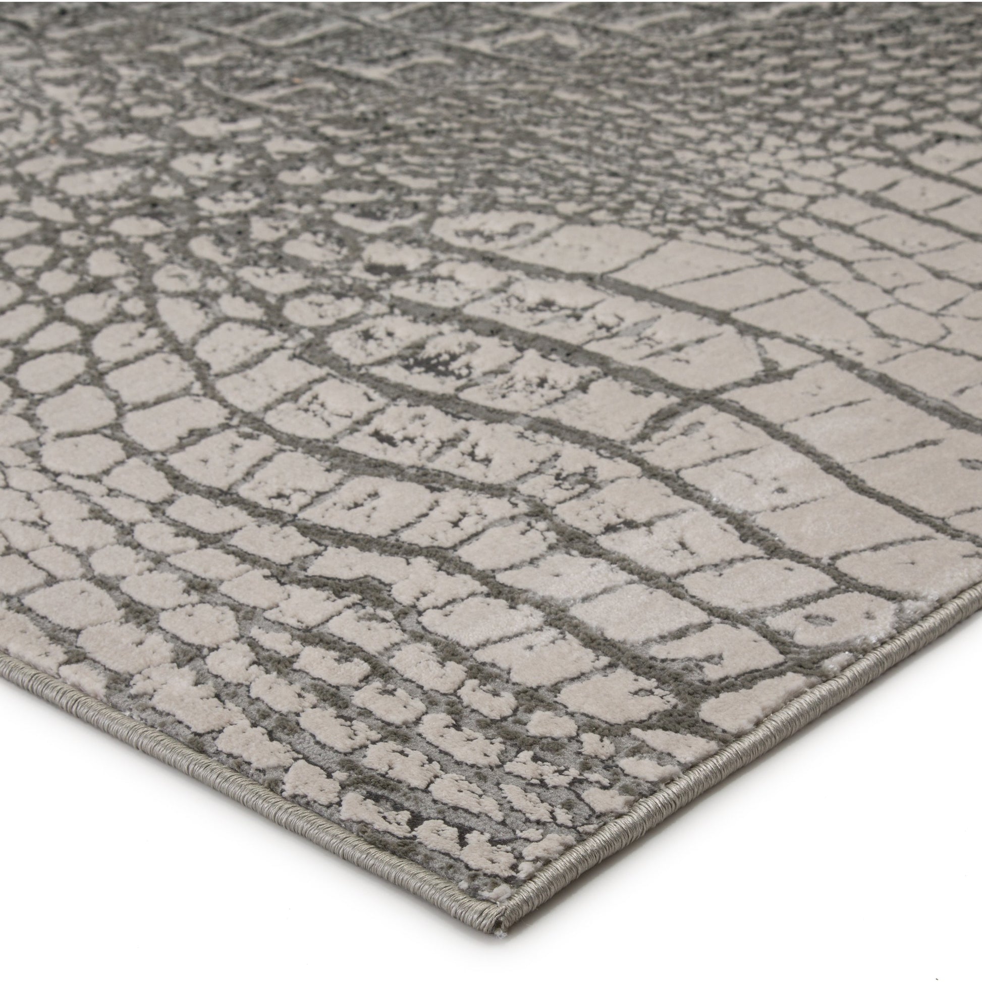 Canberra Rug by Jaipur Living in gray, black. Made from 35% metallic polyester 35% polypropylene 30% polyester in a unique style.