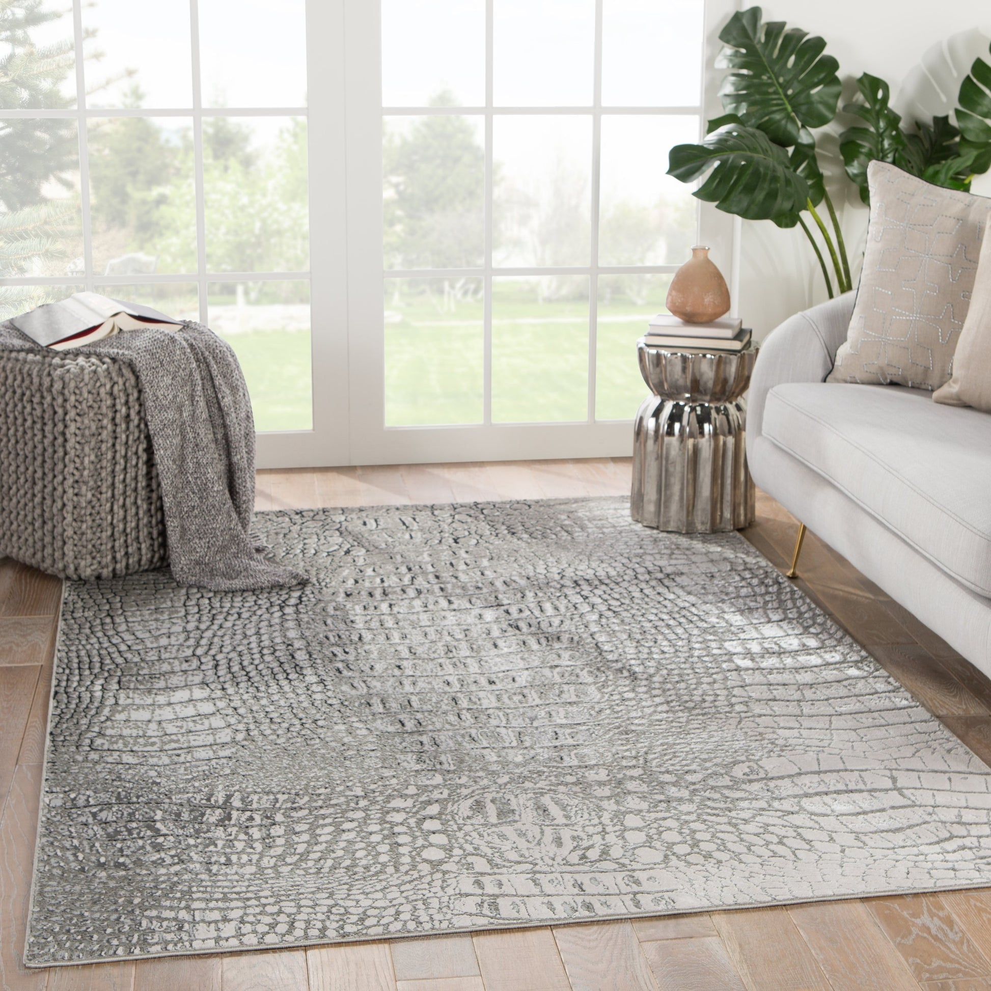 Canberra Rug by Jaipur Living in gray, black. Made from 35% metallic polyester 35% polypropylene 30% polyester in a unique style.