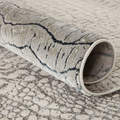 Canberra Rug by Jaipur Living in gray, black. Made from 35% metallic polyester 35% polypropylene 30% polyester in a unique style.