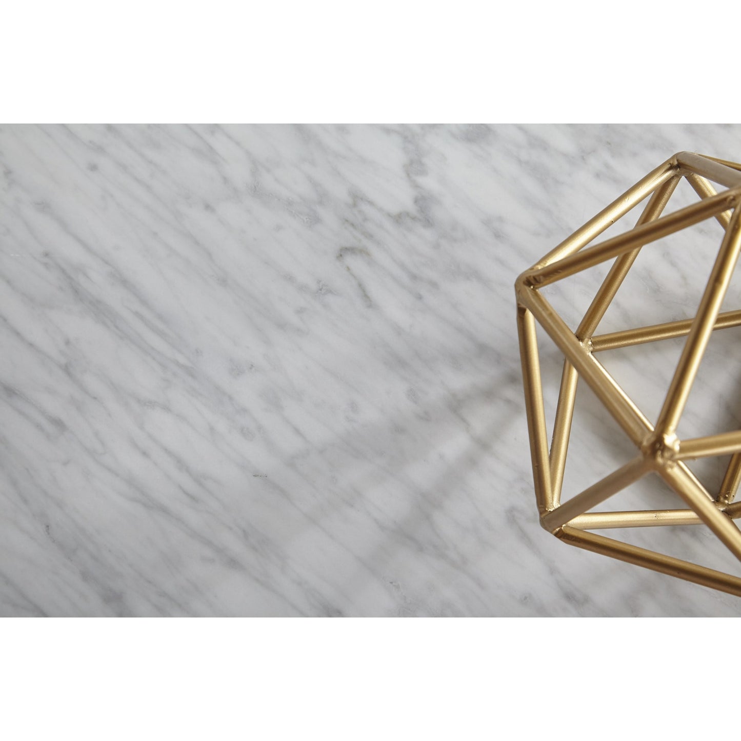 002 SR-387143 | Closeup | Carrera Nesting Coffee Table by Essentials For Living in white carrera marble, brushed gold. Made from marble veneer over mdf, metal in a modern style.