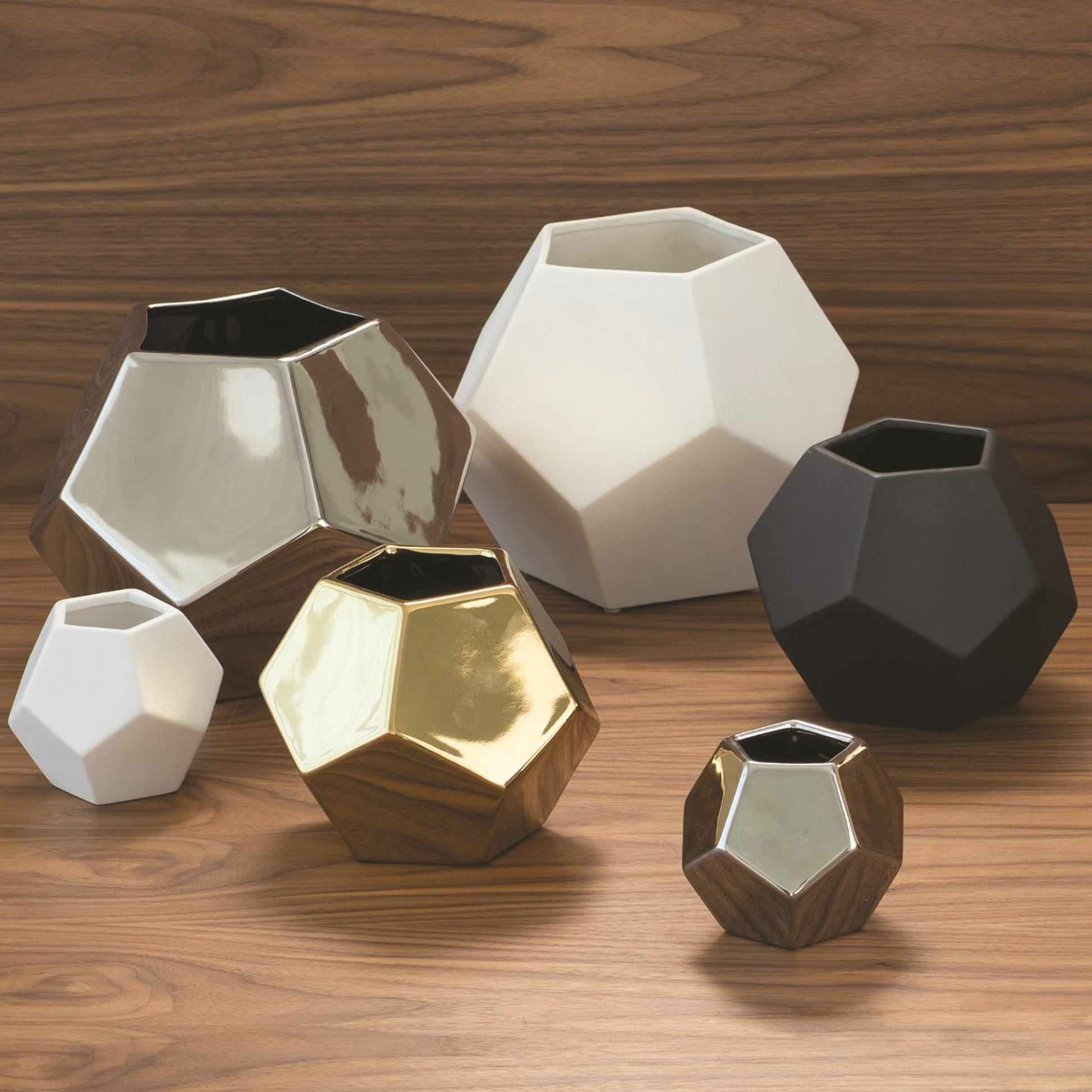Faceted Vase by Global Views. Made from ceramic in a modern style.