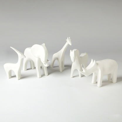 Rhino by Global Views in white. Made from ceramic in a eclectic & global style.