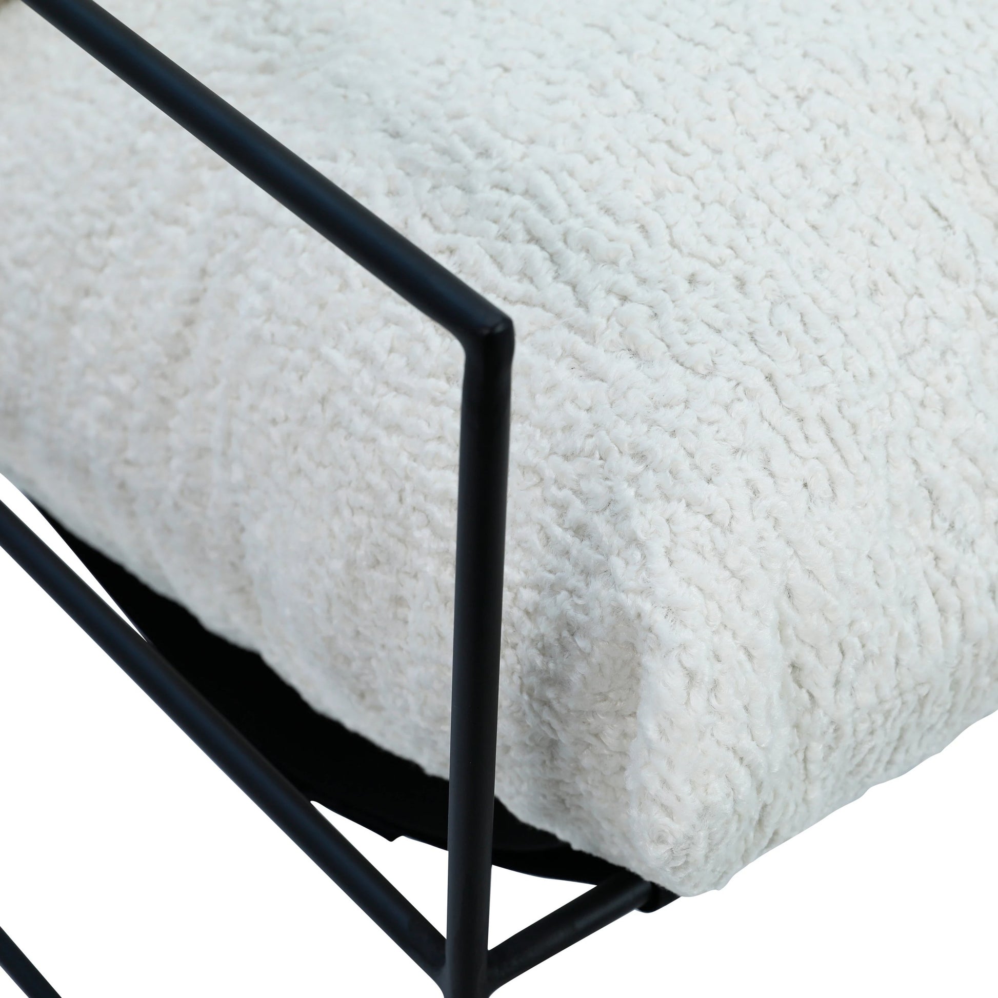 White Sheep Skin Upholstered Arm Chair by Arch & Plane in natural white, black and upholstered. Made from sheepskin in a modern style.