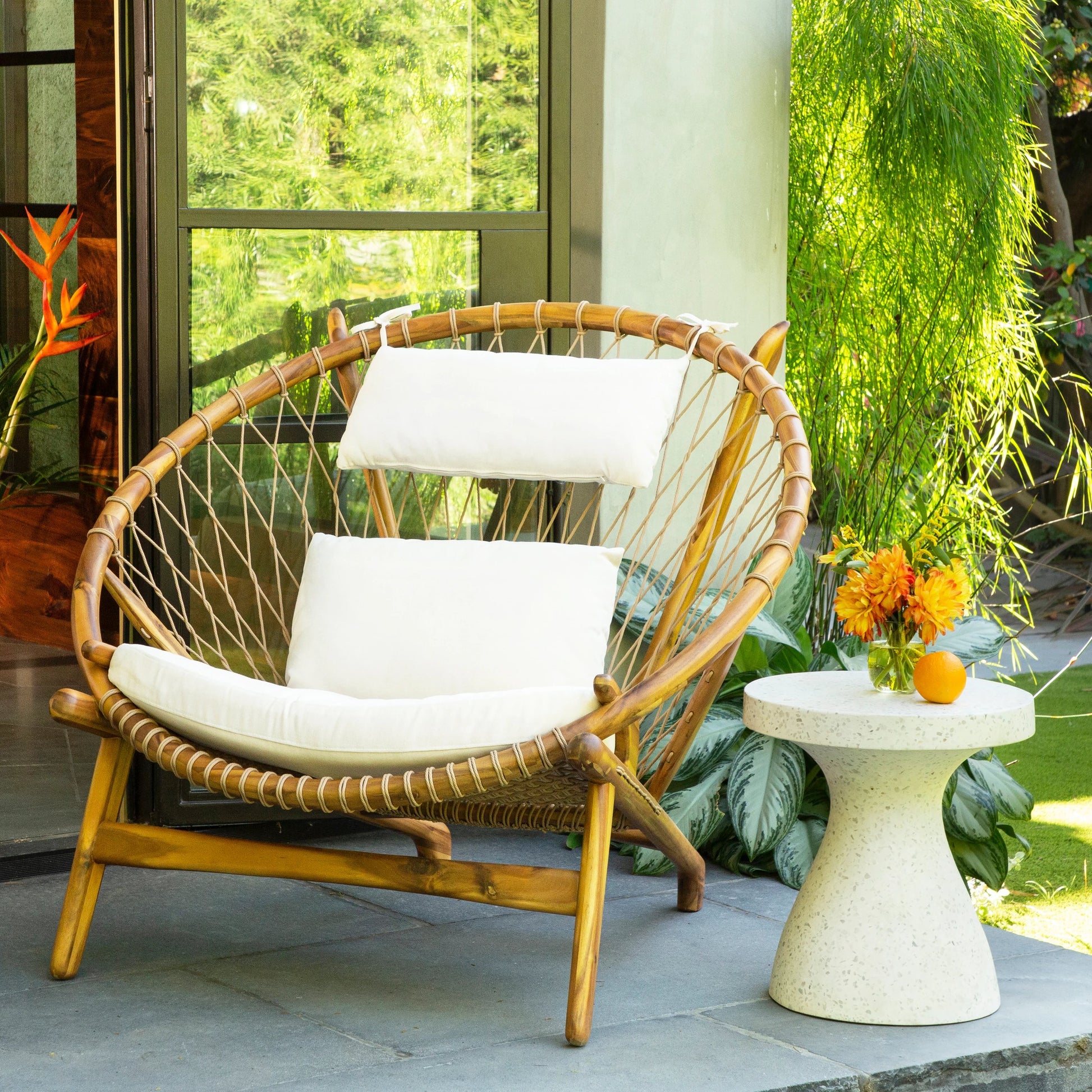 Chadrick Terrazzo Indoor/Outdoor Side Table by Arch & Plane in off white. Made from terrazzo in a modern style.