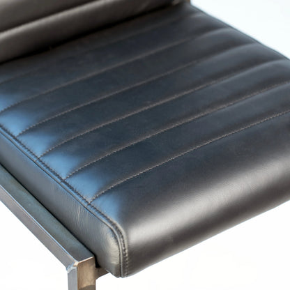 Tess Black Leather Counter Stool by Arch & Plane in black. Made from top grain leather in a modern style.