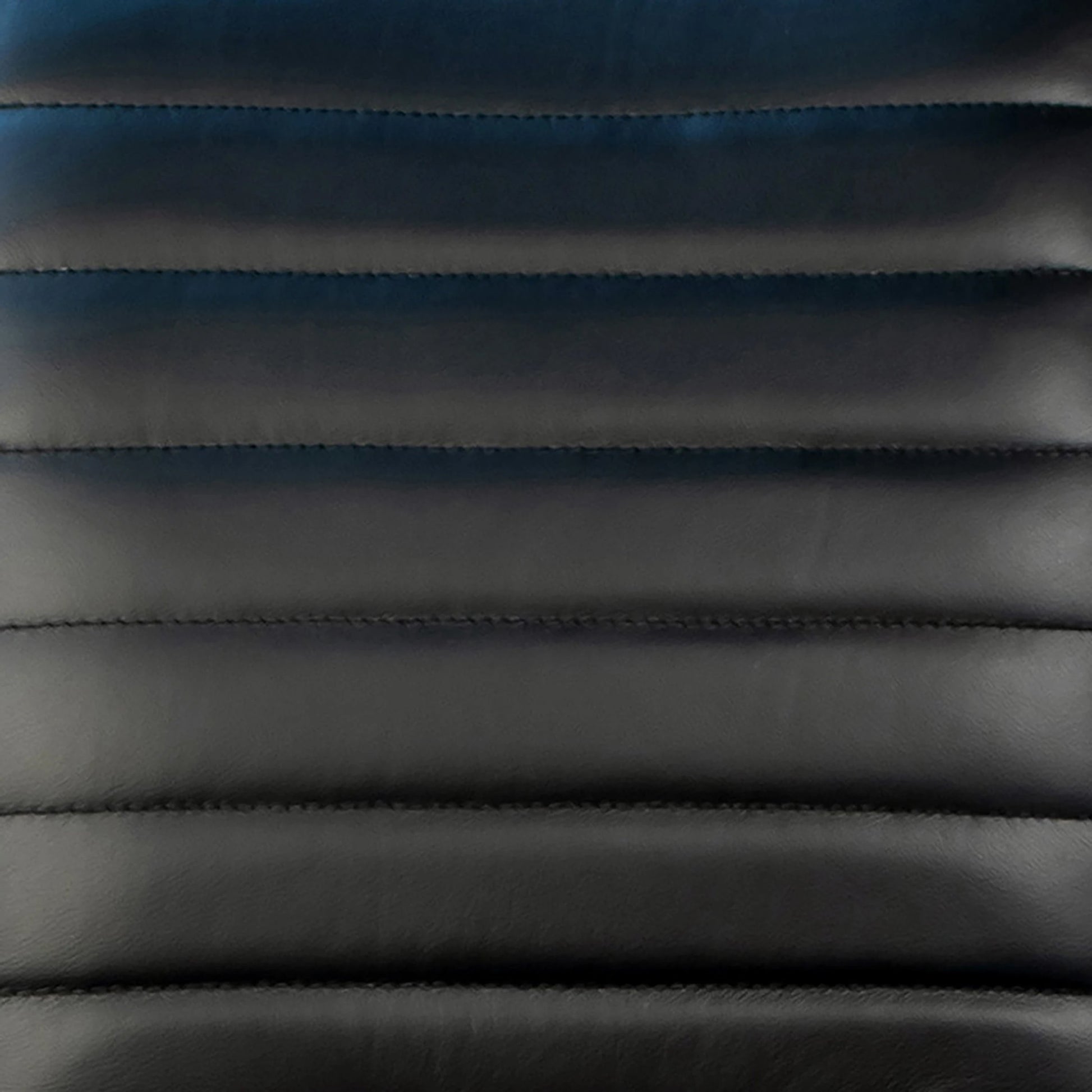 Tess Black Leather Counter Stool by Arch & Plane in black. Made from top grain leather in a modern style.