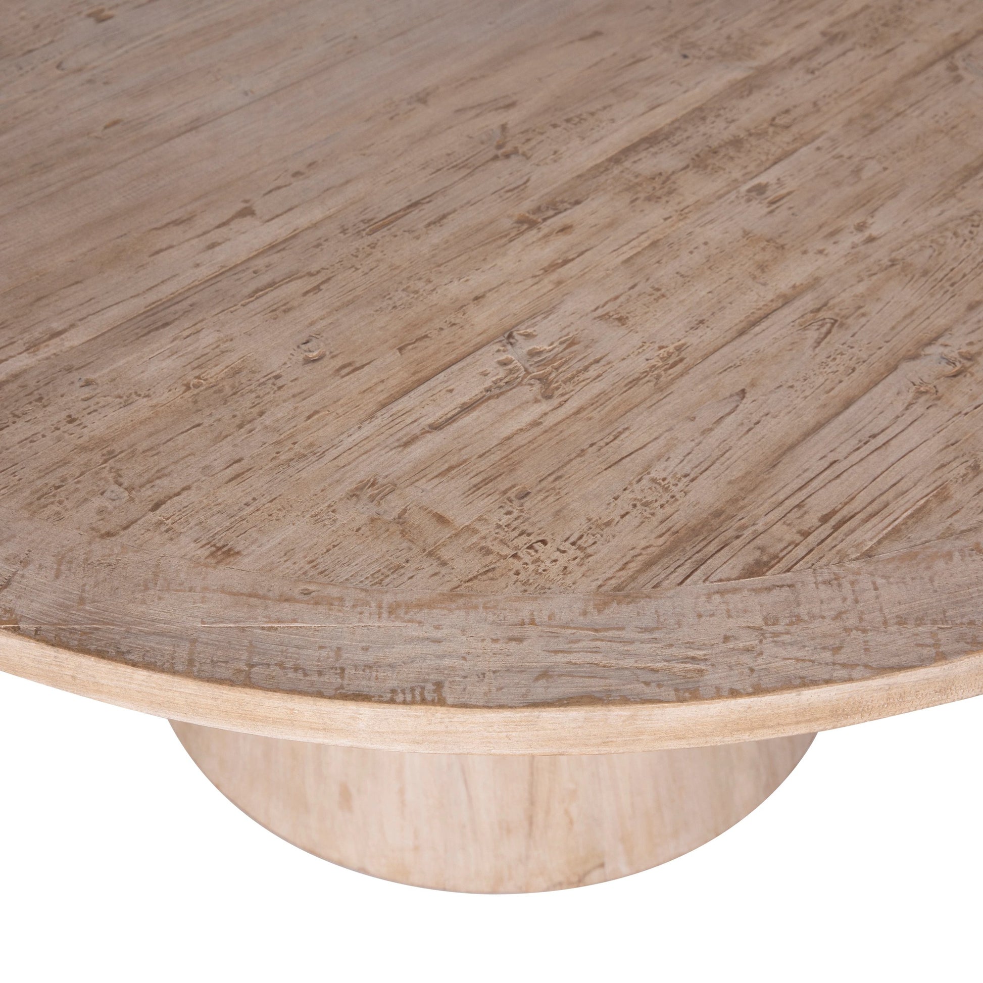 Clint Reclaimed Pine Round Pedestal Dining Table by Arch & Plane in light brown. Made from reclaimed pine in a modern style.