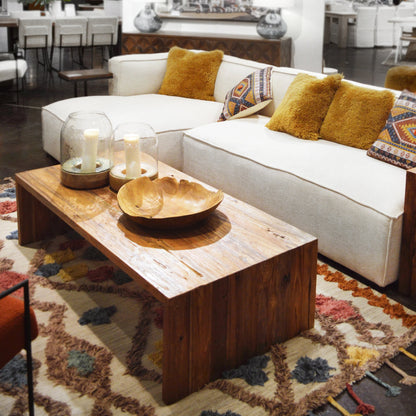 Alaina Reclaimed Teak Waterfall Coffee Table by Arch & Plane in medium brown and clear seal. Made from reclaimed teak in a modern style.