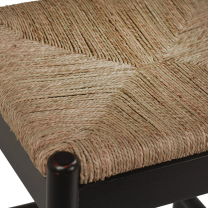 Leanne Oak and Wicker Wishbone Back Dining Arm Chair by Arch & Plane in medium brown and woven. Made from oak in a cottage & farmhouse style.