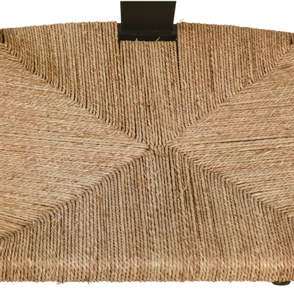 Leanne Oak and Wicker Wishbone Back Dining Arm Chair by Arch & Plane in medium brown and woven. Made from oak in a cottage & farmhouse style.