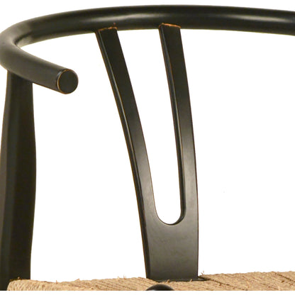 Leanne Oak and Wicker Wishbone Back Dining Arm Chair by Arch & Plane in medium brown and woven. Made from oak in a cottage & farmhouse style.