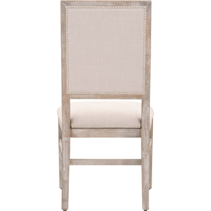 Dexter Dining Chair by Essentials For Living in stone linen, natural gray, silver nail heads. Made from rubberwood, linen in a traditional style.
