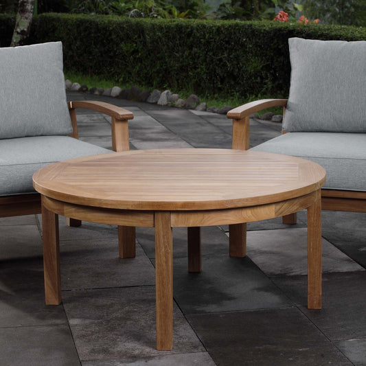 Andover Teak Round Coffee Table by Evans & Londeen in natural. Made from teak wood, cushion density is 24kg, m3 in a modern style.