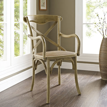 Easton Dining Armchair by Evans & Londeen in walnut. Made from chinese toon, plywood, rattan in a cottage & farmhouse style.