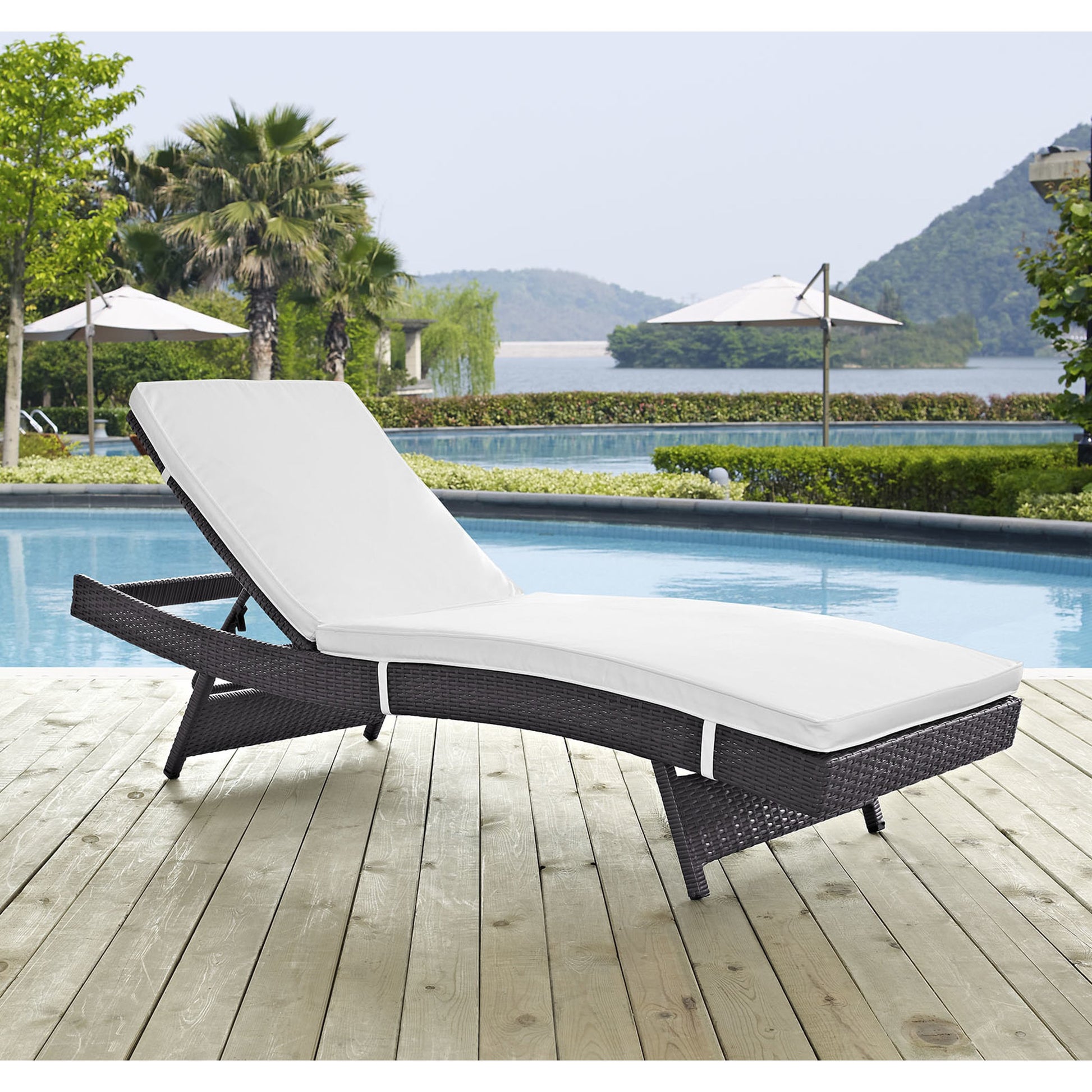 Amelia Outdoor Patio Chaise by Evans & Londeen. Made from synthetic rattan weave, powder coated aluminum, cushion density is 24kg, m3 in a modern style.