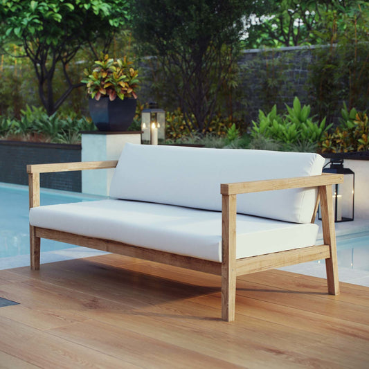 Ellie Outdoor Loveseat by Evans & Londeen in natural white. Made from teak solid wood, chair weight capacity: 1323lbs. in a modern style.