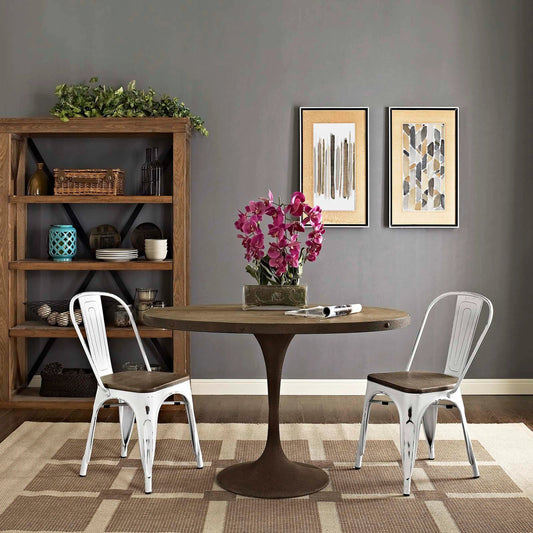 Galton Dining Side Chair (Set of 2) by Evans & Londeen in white. Made from distressing powder coated steel, laminated bamboo cushion with paint in a modern style.