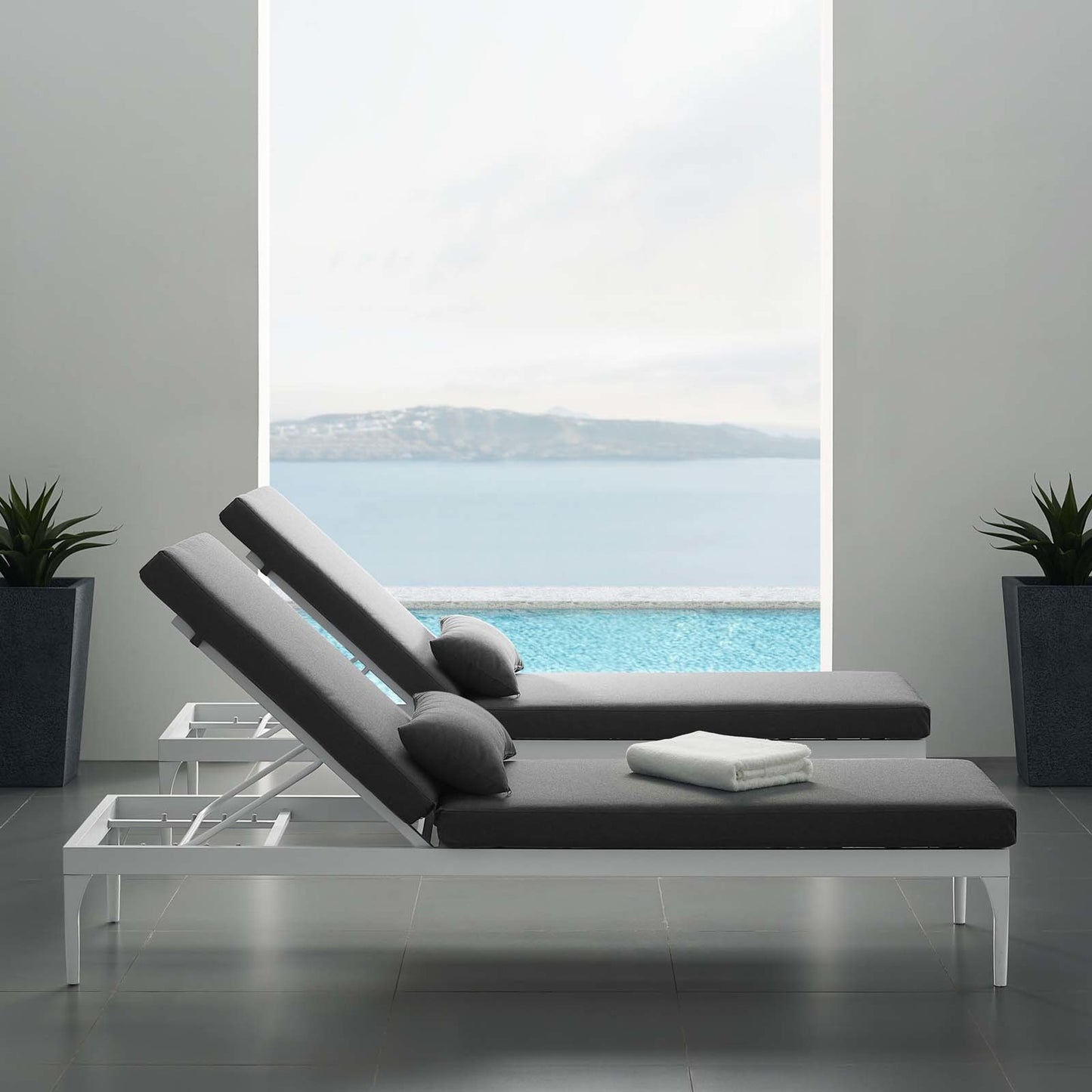 022 SR-390297 | Lifestyle | Crockett Cushion Chaise Lounge Chair by Evans & Londeen. Made from foam 3in thick, grey-weimas#7101-20, charcoal-solution dye#mw003, navy-weimas#7101-76, peridot-weimas#5201-82, turquoise-weimas#1451-13, aluminum frame, kd struc