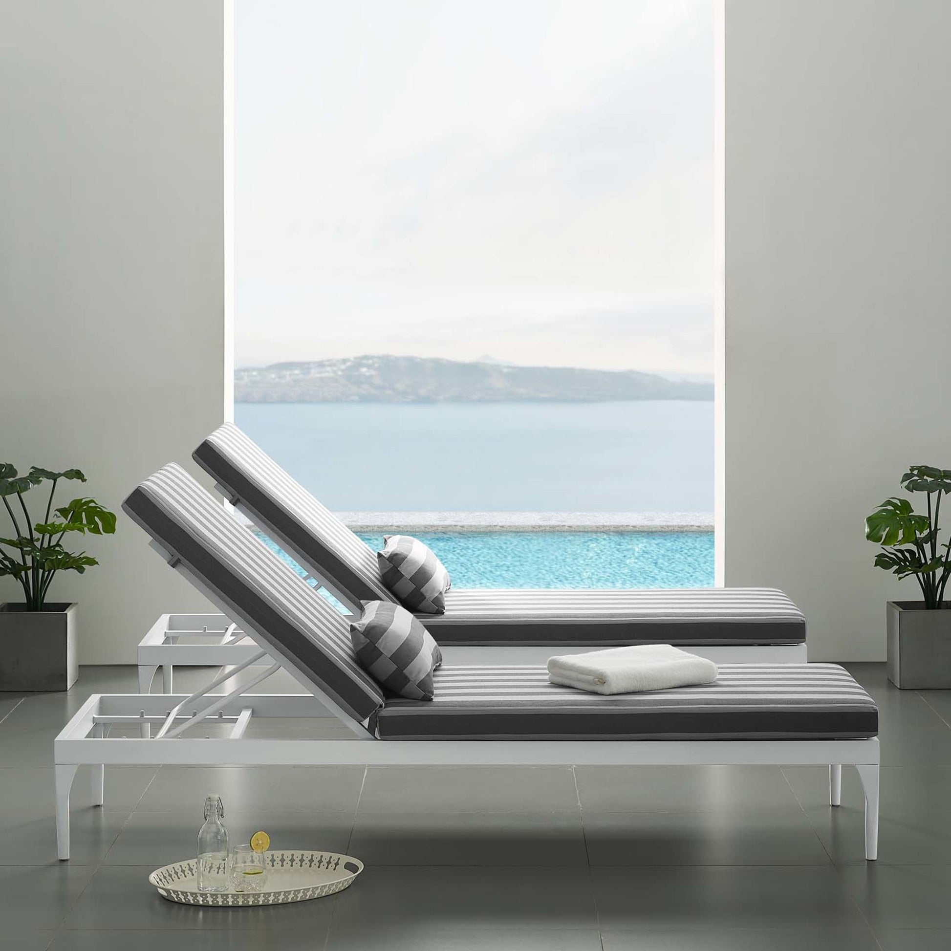 Crockett Cushion Chaise Lounge Chair by Evans & Londeen. Made from foam 3in thick, grey-weimas#7101-20, charcoal-solution dye#mw003, navy-weimas#7101-76, peridot-weimas#5201-82, turquoise-weimas#1451-13, aluminum frame, kd struc