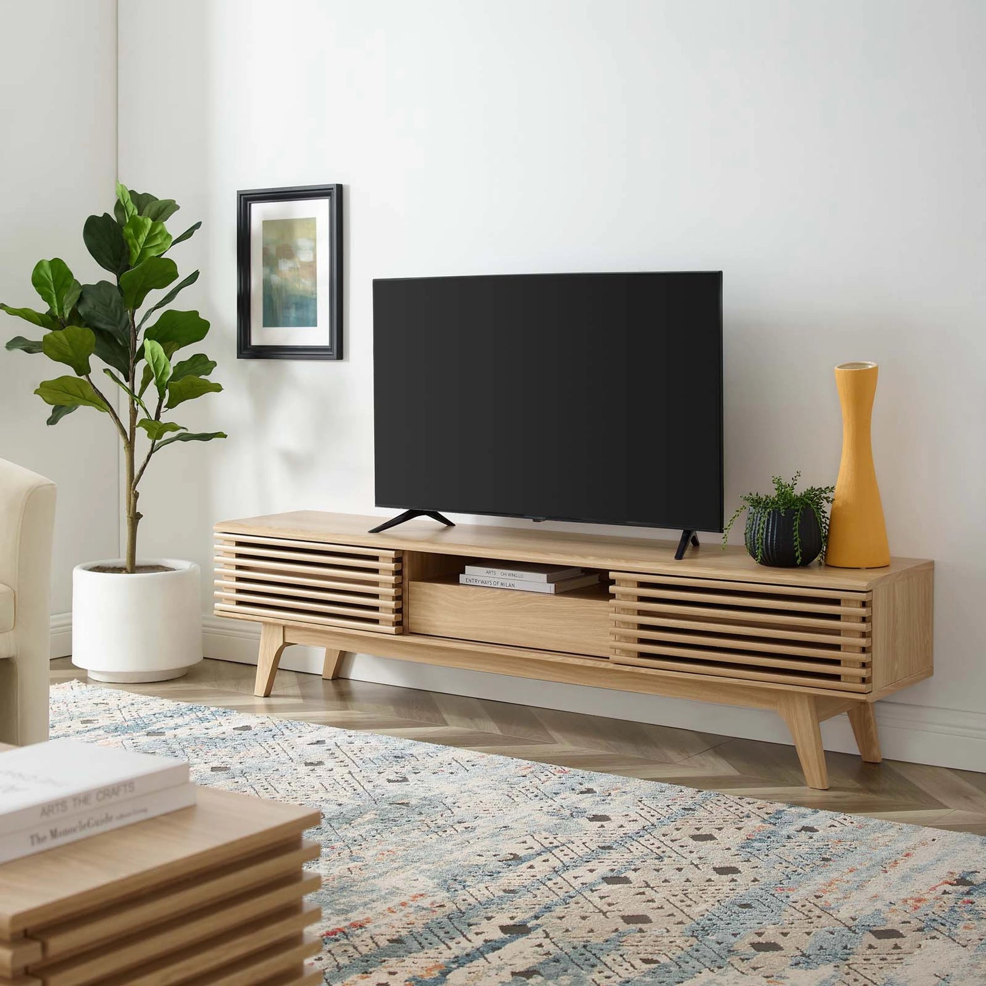 Rennell 70" TV Stand by Evans & Londeen. Made from particle board, mdf in a modern style.
