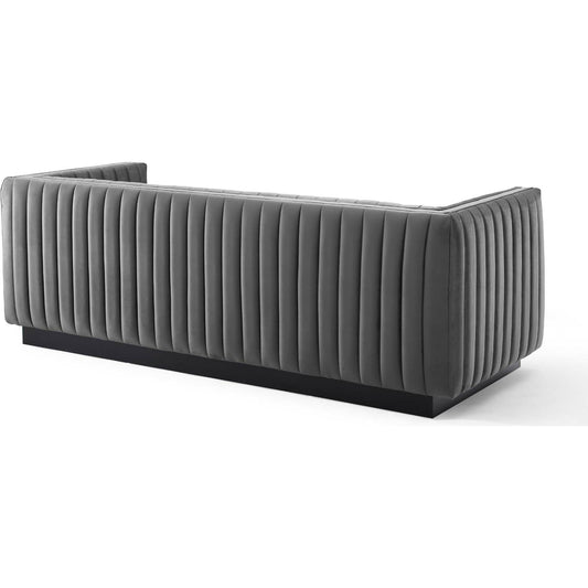 Stone Channel Sofa by Evans & Londeen in gray. Made from spring pocket inside the seat cushion, seat cushion foam density 28kgs, m3, yuhua velvet fabric, polyester, solid wood frame in a modern style.