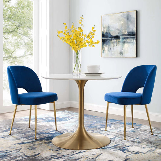 Alamosa Upholstered Velvet Dining Chair (Set of 2) by Evans & Londeen. Made from bottom 0.5int plywood, top 0.5int plywood, foam w, m3, 0.5int bentwood, 1int density 89lbs, 100% polyester, stainless steel tube chromed gold colo