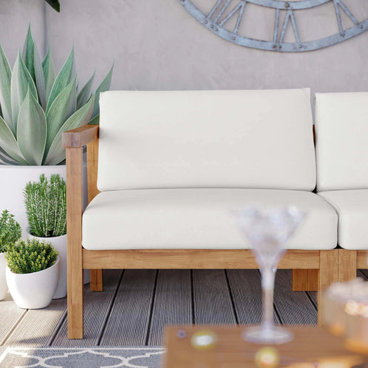 Ellie Teak Loveseat by Evans & Londeen in natural white. Made from fabric cartenza 130, foam density 22 in a modern style.