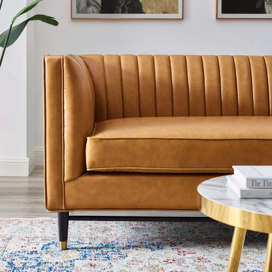 Harrison Channel Vegan Loveseat by Evans & Londeen in tan. Made from huajin tan, rubber wood legs painted in black, m3, 25mmt foam density in a modern style.